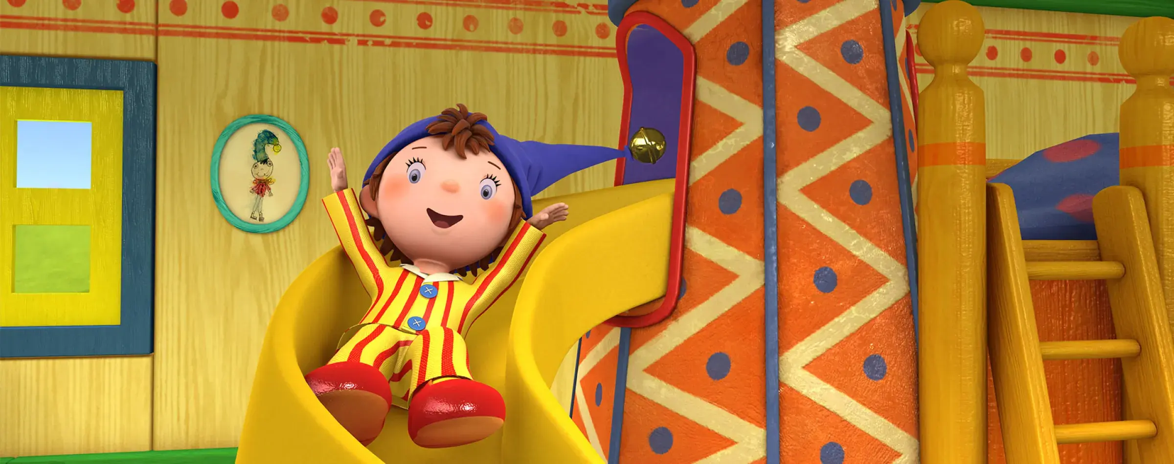 Noddy sliding down a slide