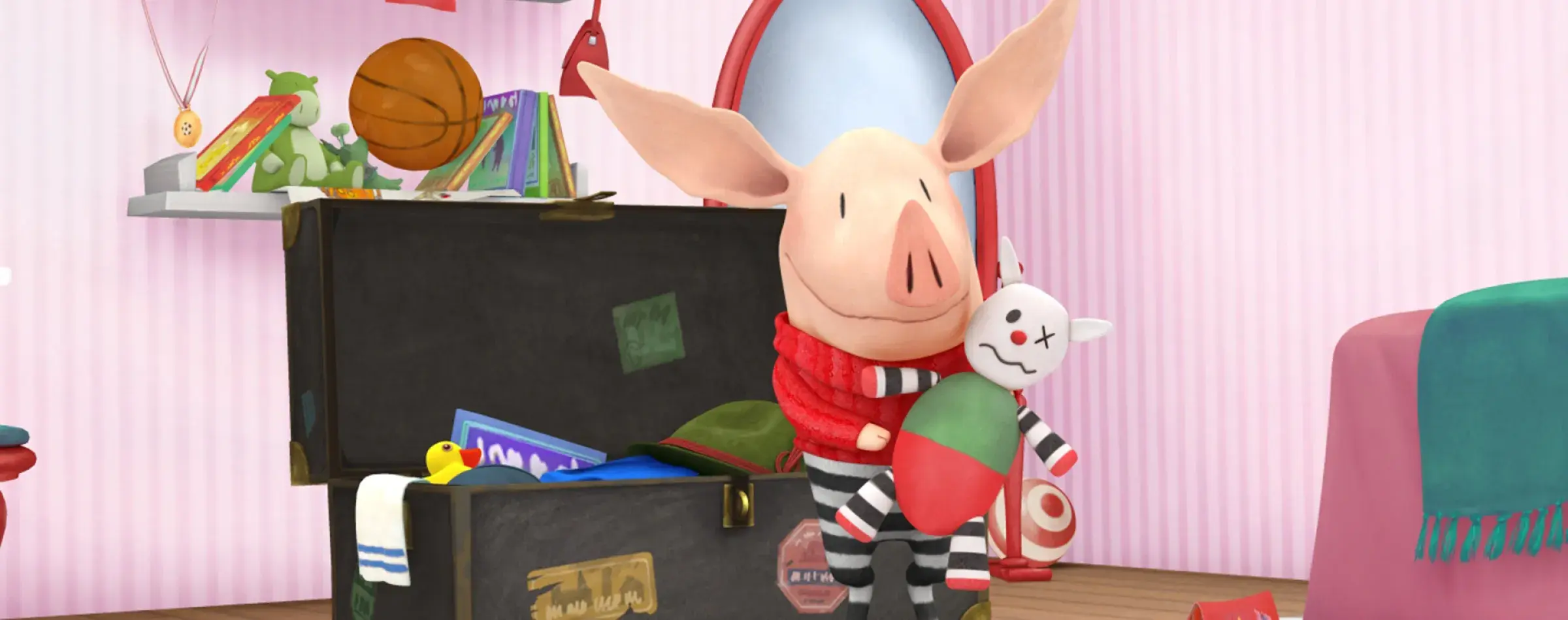 The character of Olivia the pig and her toy inside a room filled with objects, sitting together at a desk or table.