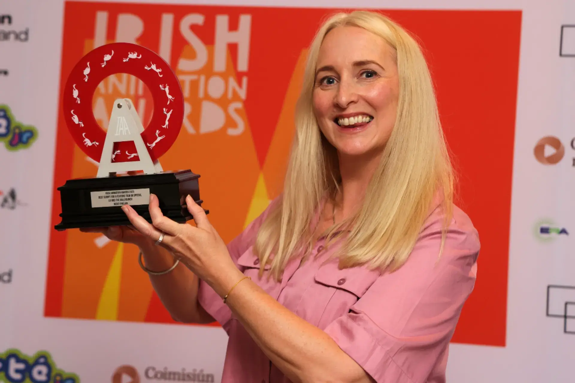 Irish Animation Awards 2025 Awards staff member with trophy