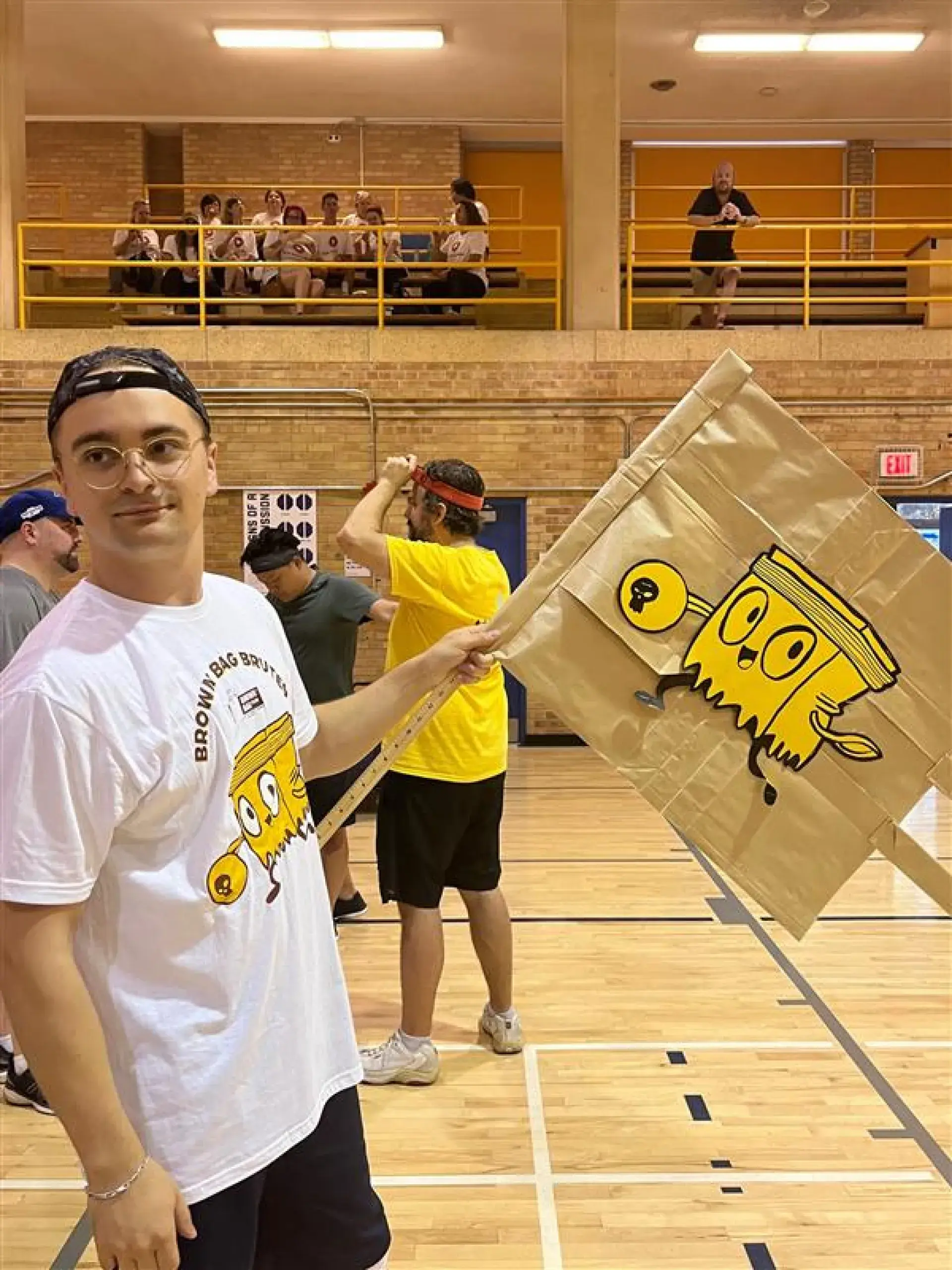 Brown Bag Films at dodge ball tournament - player holding a flag