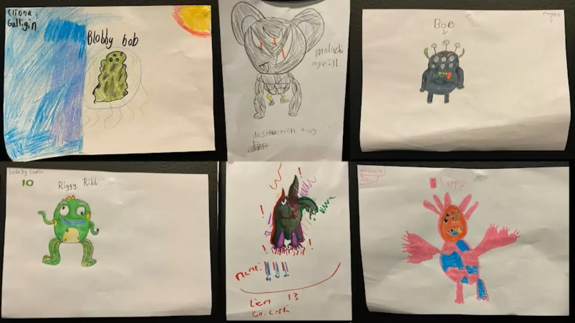 Six hand-drawn monster illustrations by kids displayed on white paper sheets.