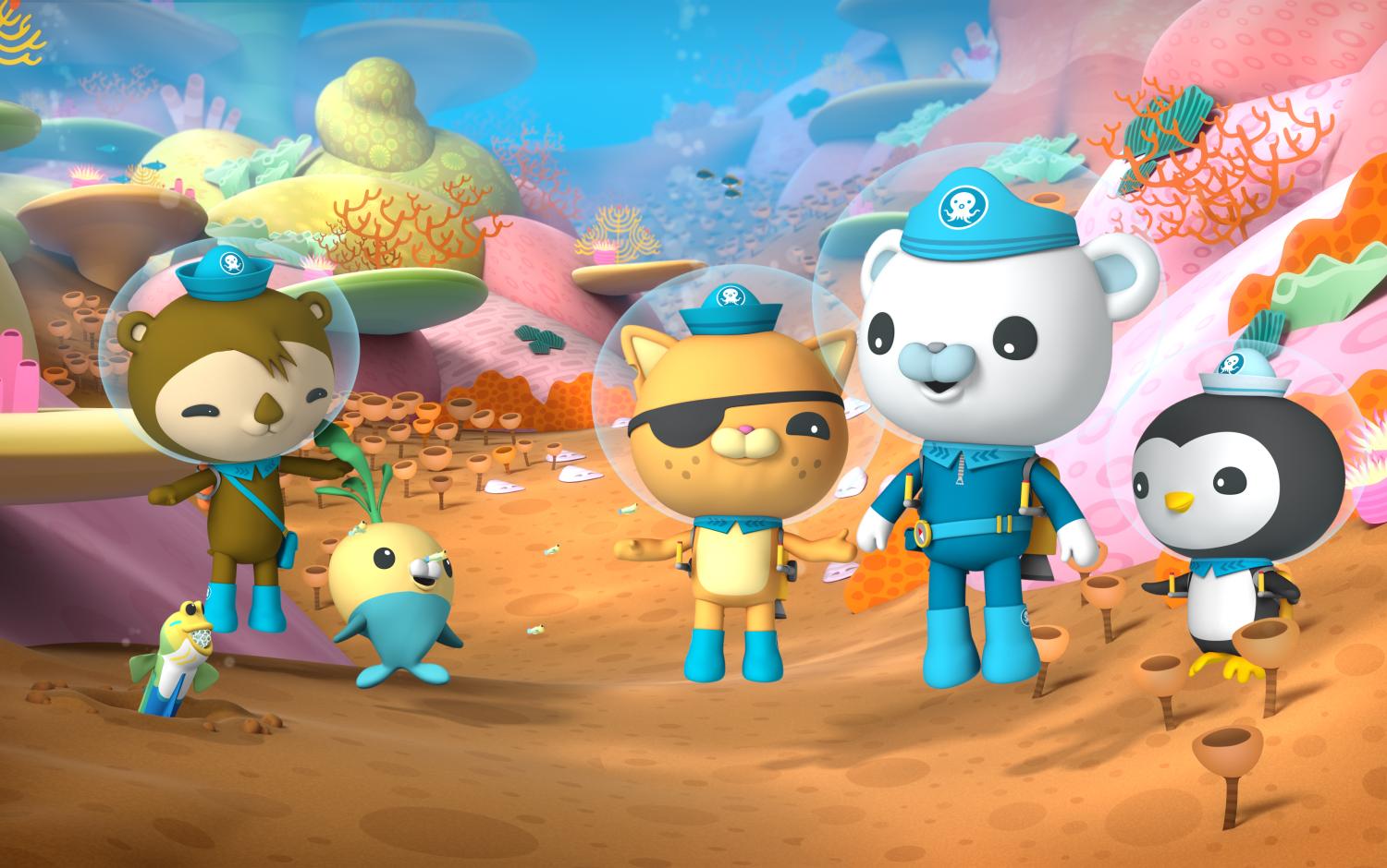 The Octonauts standing in a coral reef