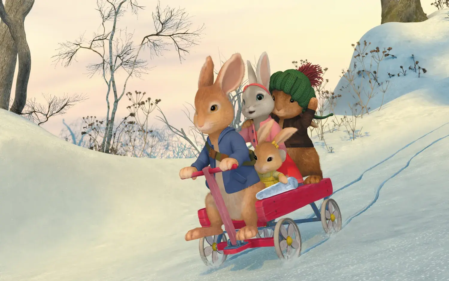 Peter, Lily and Benjamin in a cart rolling through the snow