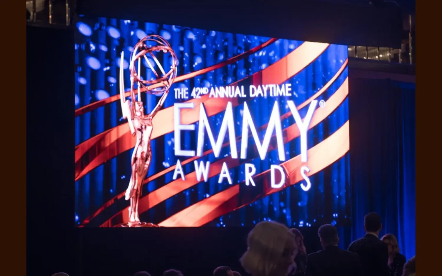 Large screen displaying “The 42nd Annual Daytime Emmy Awards” with event graphics.