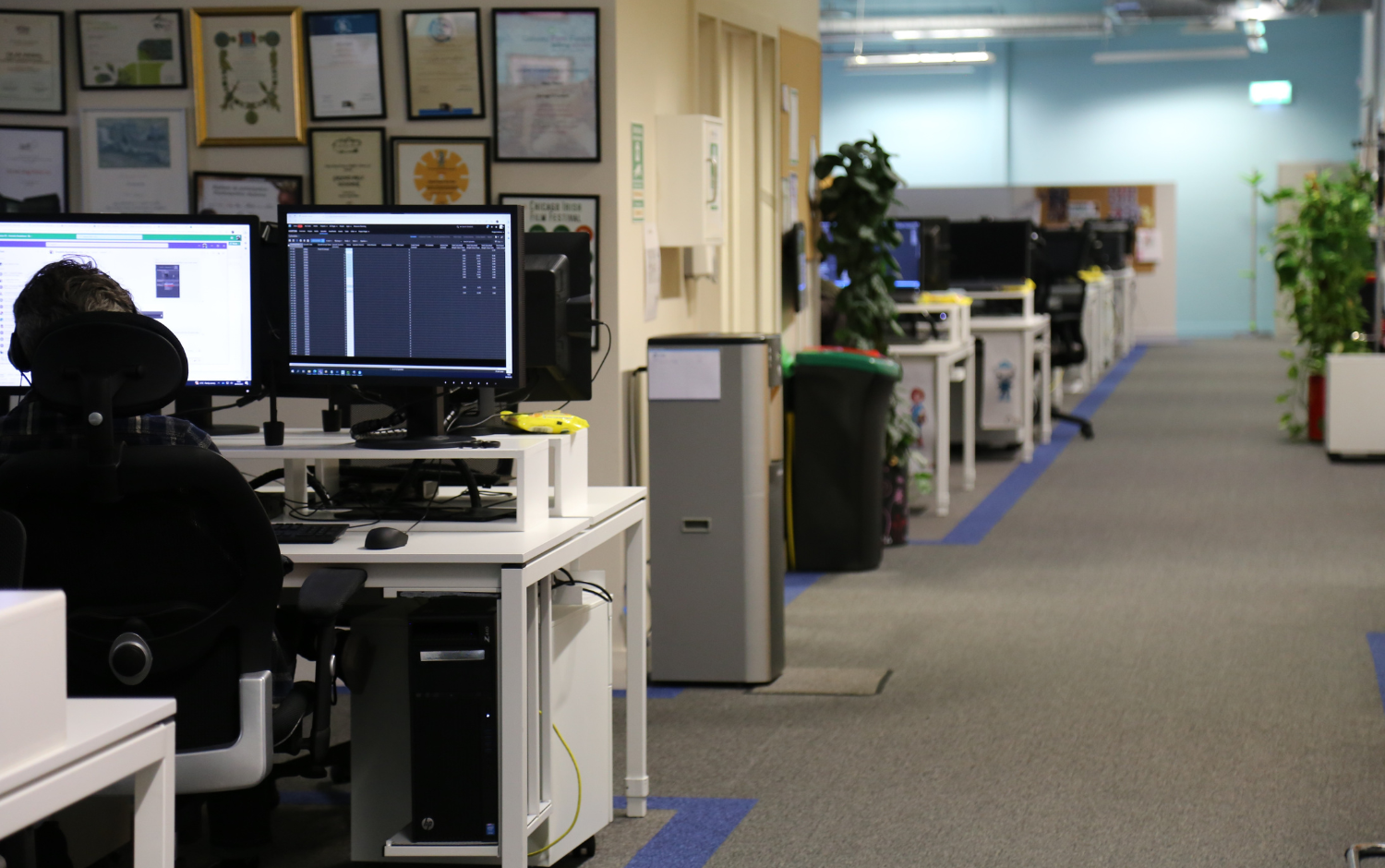 Photo of the open plan area in Brown Bag Films' Dublin studio featuring rows of desks with monitors.
