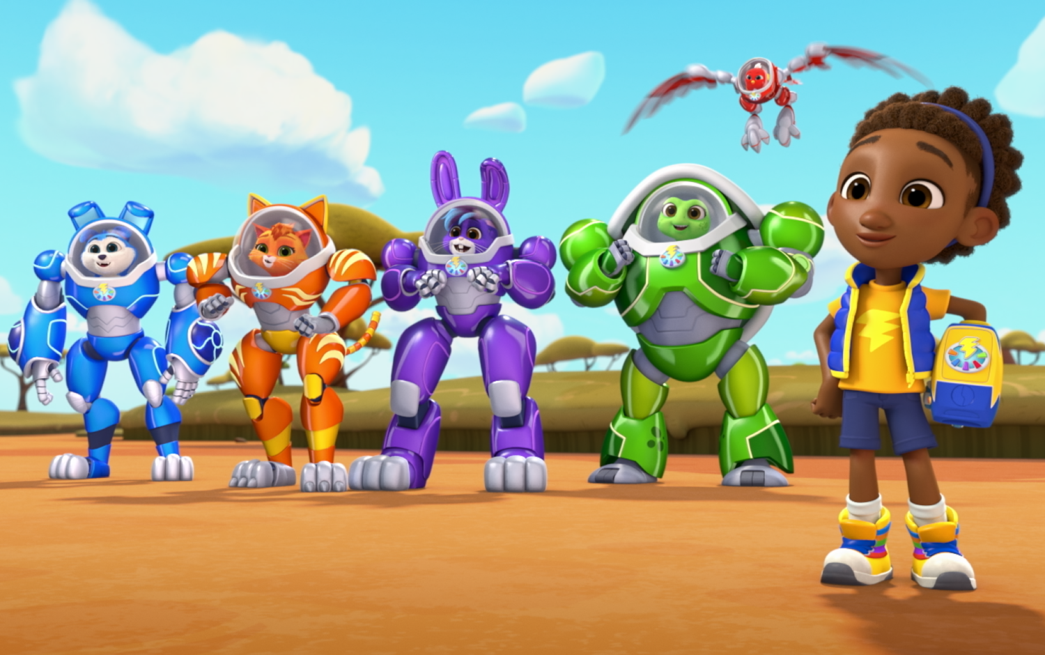 A group of brightly colored robotic animal characters from the animated series RoboGobo stand together outdoors on a sunny day. The background shows an open landscape with scattered trees under a blue sky with clouds.