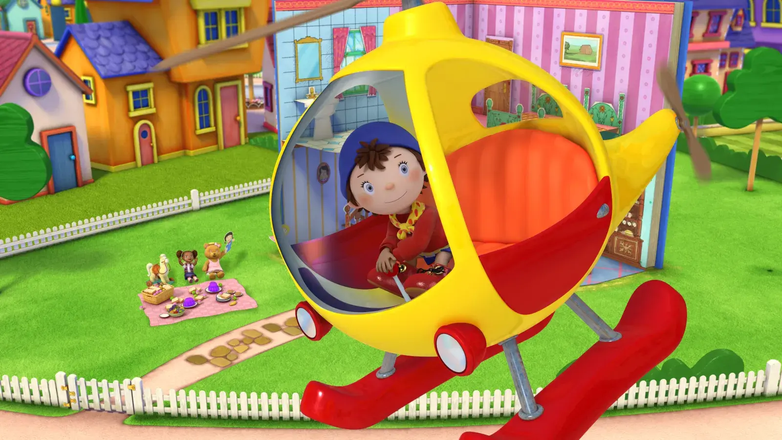 Noddy in a yellow and red helicopter soaring above Toyland
