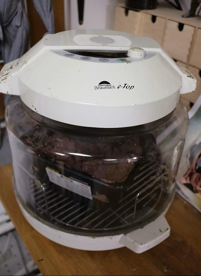 Countertop convection oven used for heating and conditioning sculpting clay.