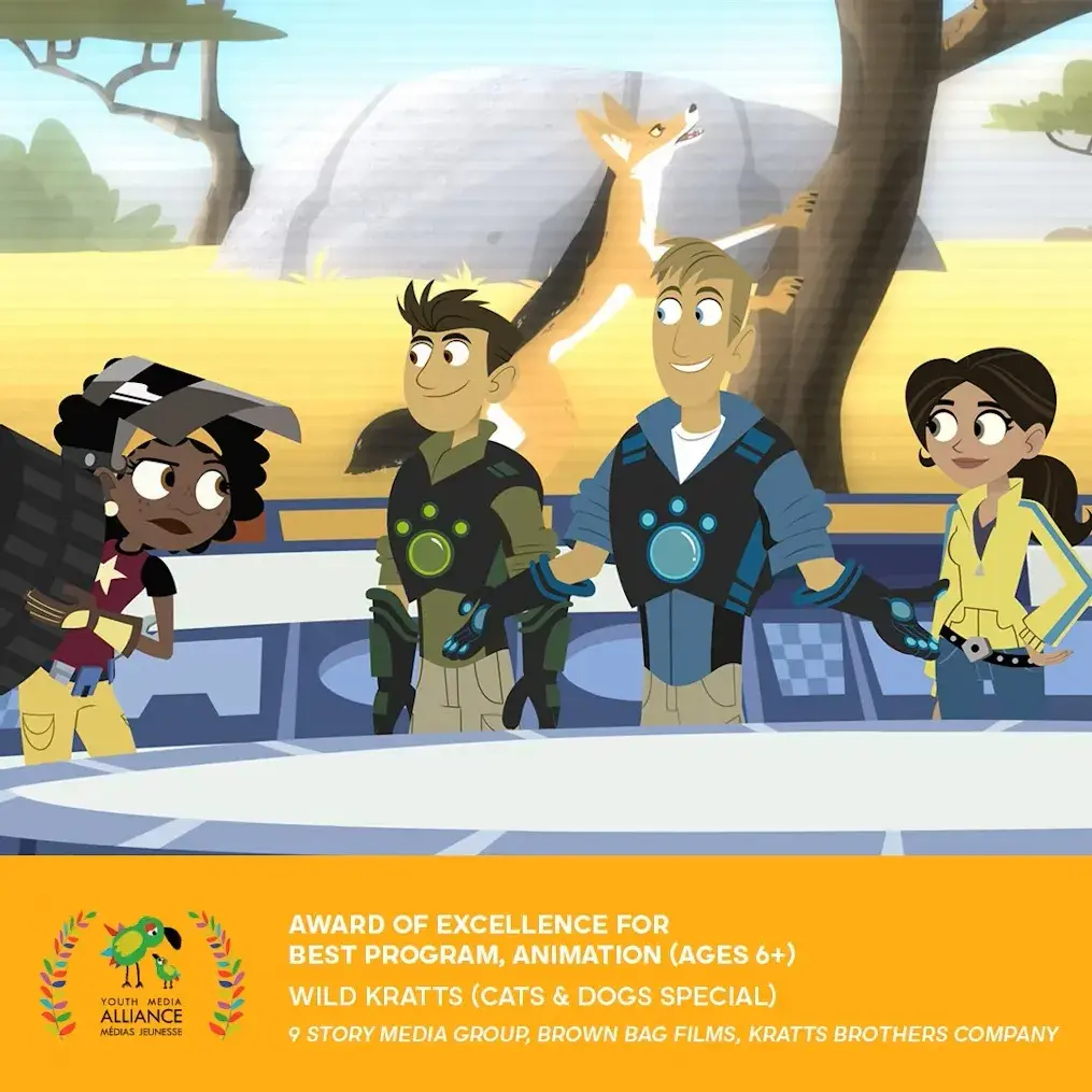 Animated Wild Kratts characters in creature power suits standing at a console with a fox in the background.