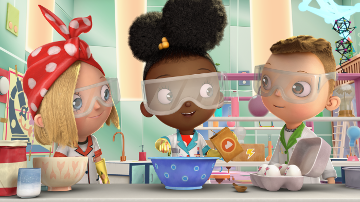 Rosie, Ada, and Iggy baking something in the kitchen