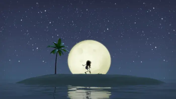 A still from the short film An Ode to Love, showing a man deserted on a beach with a stick