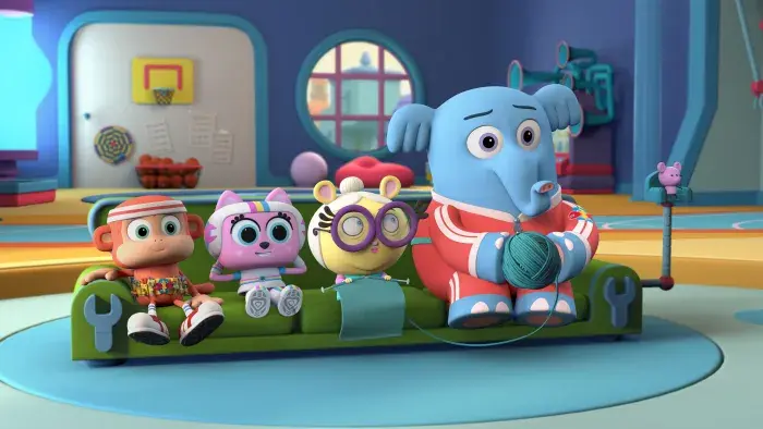 Chico Bon Bon and the Fix-It Force sitting on a green couch