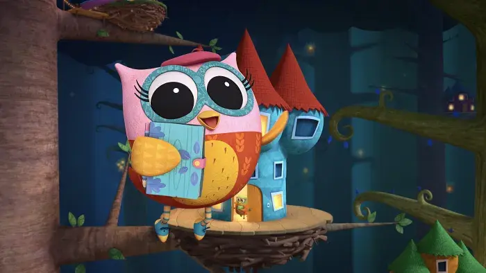 Eva the Owlet holding her journal while flying in front of Treetopington