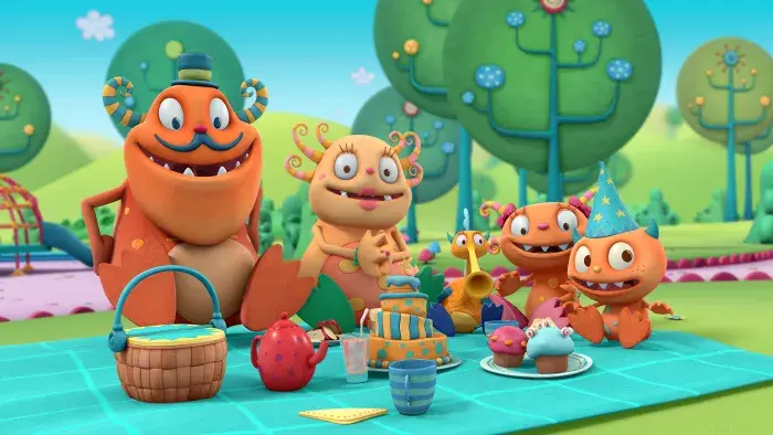 A monster family having a picnic