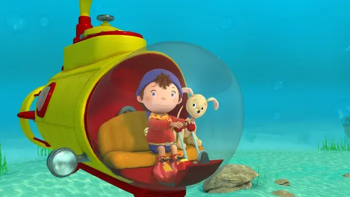 Noddy and his dog in a submersible vehicle in the ocean
