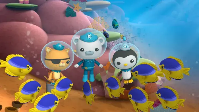 Kwazii, Captain Barnacles and Peso swimming with some blue and yellow fish