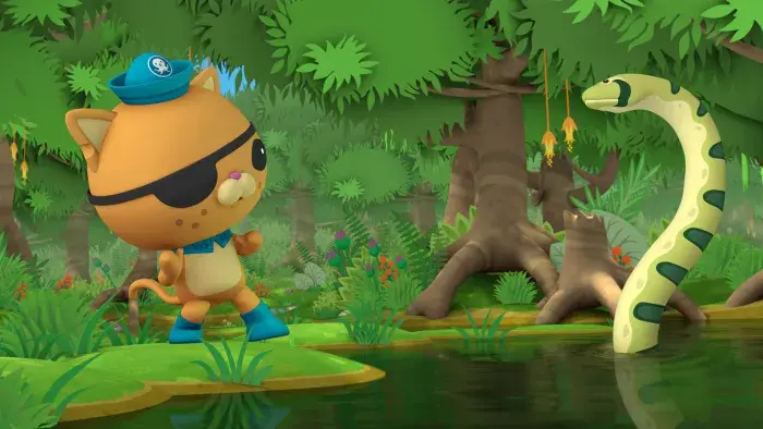 Kwazii looking at a snake in the swamp