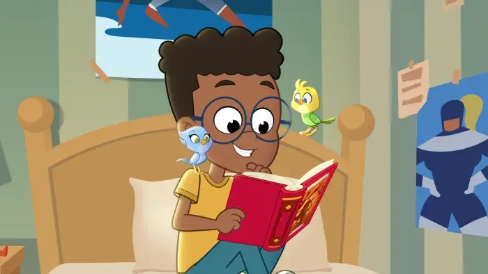 Max reading a book with Ace and Polly 