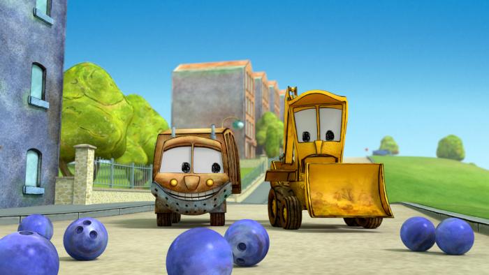 The characters Stinky and Dirty chasing some bowling balls that are on the road