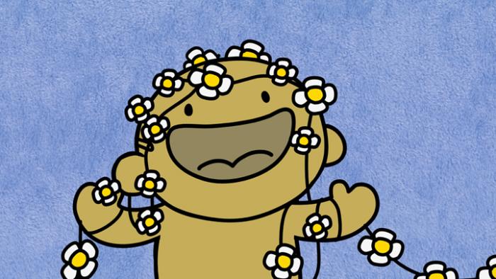 a character from Wobblyland with a daisychain all over him