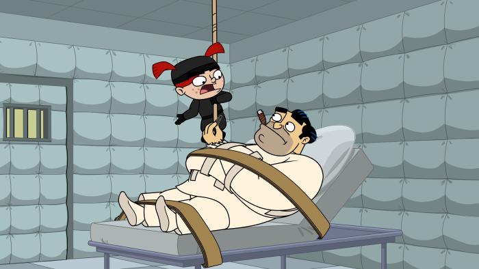 Fugget About It - Episodic Still - Gina suspends from ceiling over Jimmy who is bound to the table.